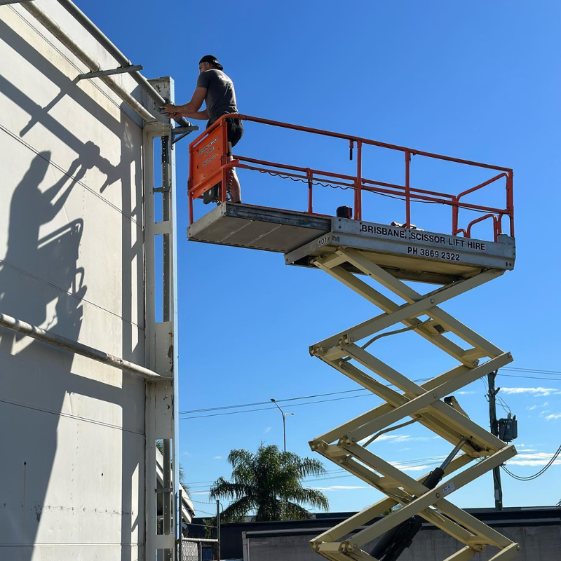 working using hydraulic scissor lift working using hydraulic scissor lift